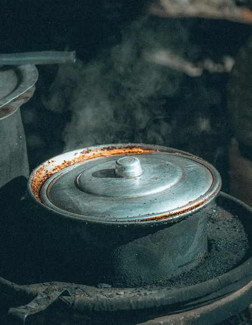 Sauce roasting over open flame — tandoori style